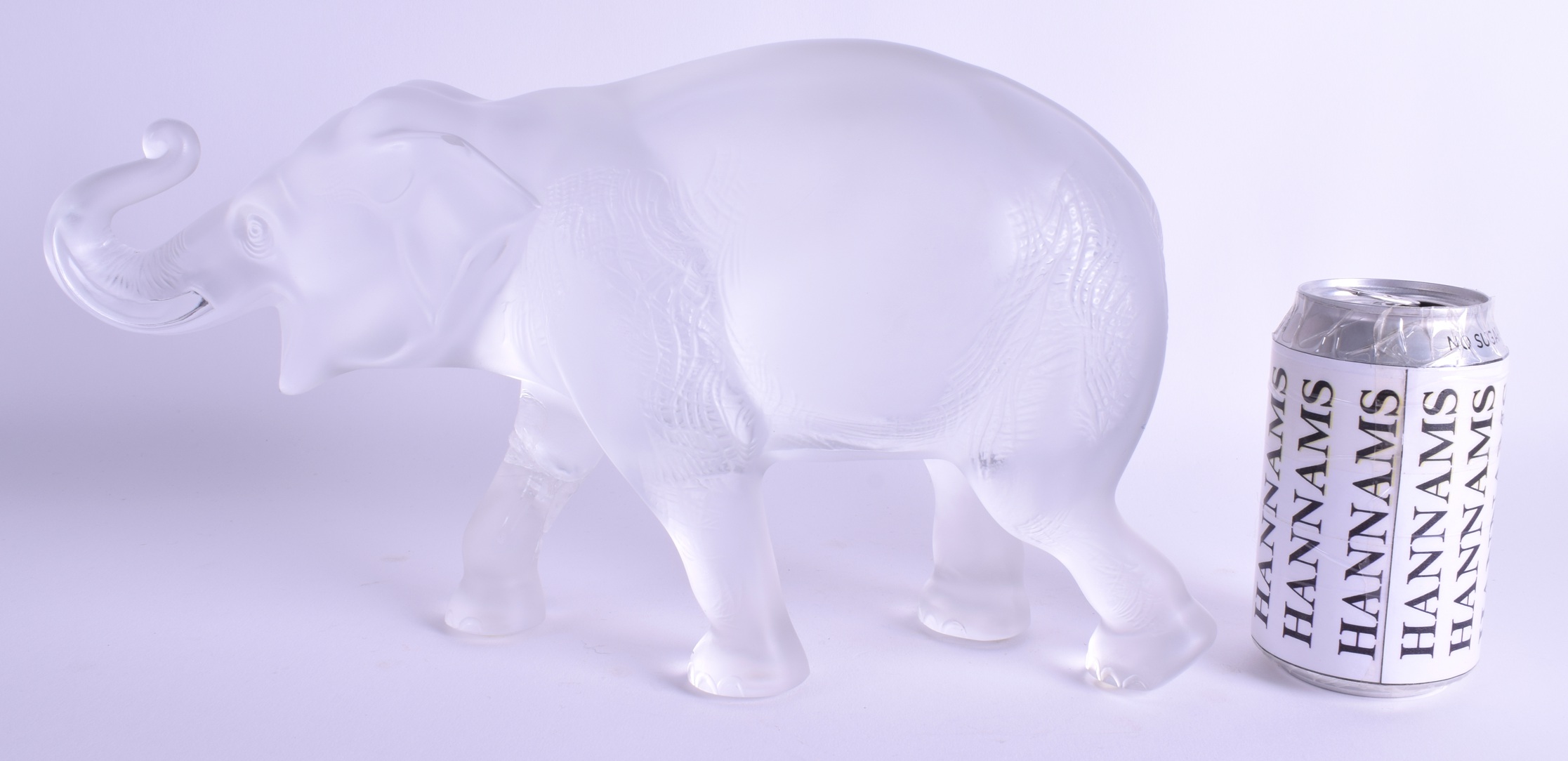 A RARE LARGE LALIQUE CRYSTAL GLASS FIGURE OF A SUMATRA ELEPHANT modelled in a roaming stance. 35 cm