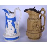 A BLUE AND WHITE POTTERY JUG DECORATED IN RELIEF WITH NEO CLASSICAL FIGURES, together with another j