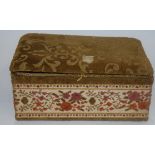 AN EARLY 20TH CENTURY EMBROIDERED BOX OR CASKET, decorated with foliage. 29.5 cm wide.