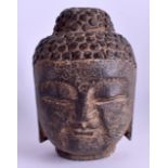 A 17TH/18TH CENTURY CHINESE TIBETAN CARVED HEAD OF A BUDDHA. 13 cm x 8 cm.