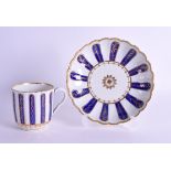 A RARE 18TH CENTURY WORCESTER COFFEE CUP AND SAUCER painted with an unusual blue & gilt pattern. (2)