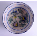 AN EARLY ART DECO CHARLES COLLARD HONITON POTTERY BOWL painted with floral sprays. 25 cm diameter.