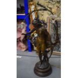 A LARGE 19TH CENTURY FRENCH SPELTER FIGURAL LAMP modelled as a female upon a circular pedestal. 102