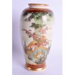 AN EARLY 20TH CENTURY JAPANESE TAISHO PERIOD SATSUMA VASE painted with a bird amongst bamboo. 17 cm