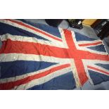 A VERY LARGE VINTAGE UNION JACK OF NAVAL INTEREST, reputedly from HMS Bellerephon. 157 cm x 327 cm.