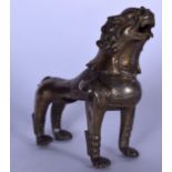 A CHINESE QING DYNASTY BRONZE STATUE OR FIGURE OF A MYTHICAL BEAST, formed standing with head raised