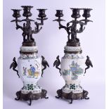 A PAIR OF 19TH CENTURY CHINESE FAMILLE VERTE VASES AND COVERS converted to candlesticks. 42 cm high.