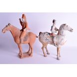 A GOOD PAIR OF CHINESE HAN DYNASTY FIGURES OF HORSES each modelled with attendants. 33 cm x 24 cm.