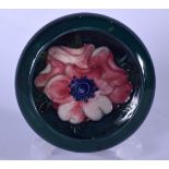 A MOORCROFT POTTERY SHALLOW BOWL OR ASHTRAY, green ground and decorated with bold foliage. 8.5 cm x