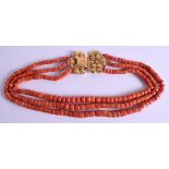 AN 18CT YELLOW GOLD CHINESE CARVED RED CORAL NECKLACE. 162 grams. 46 cm long.