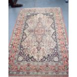 A 20TH CENTURY FINELY KNOTTED PERSIAN ISFAHAN RUG, decorated with extensive foliage. 183 cm x 123 cm