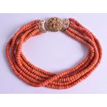 A GOOD 18CT GOLD CHINESE RED CORAL NECKLACE with open work mounts. 192 grams. 40 cm long.