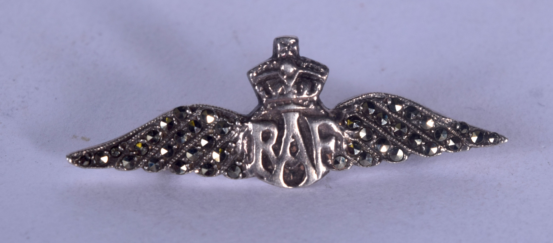 A SOLID SILVER RAF BADGE OR BROOCH, marked "silver". 4.1 cm wide.