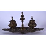 AN EARLY 20TH CENTURY FRENCH DOUBLE INKWELL BRONZE DESK STAND, decorated with extensive foliage. 43