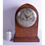 A LARGE EDWARDIAN MAHOGANY MANTEL CLOCK with silvered dial and black numerals. 42 cm x 24 cm.