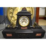 AN EARLY 20TH CENTURY SLATE CLOCK, inset with red marble panels. 51 cm wide.