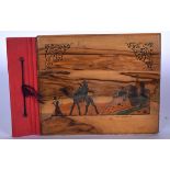 AN EARLY 20TH CENTURY OLIVE WOOD PHOTOGRAPH ALBUM, images from Jerusalem and Jericho. 26 cm wide.
