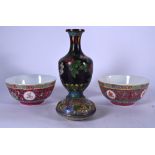 A PAIR OF RED GROUND CHINESE PORCELAIN BOWLS, together with a cloisonne enamel rouge pot and a vase.