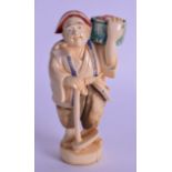 A LATE 19TH CENTURY JAPANESE MEIJI PERIOD CARVED IVORY OKIMONO modelled as a male holding a basket.
