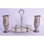 A PAIR OF EARLY 20TH CENTURY CONTINENTAL SILVER VASES together with a silver cruet. 10.7 oz. (3)