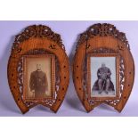 A PAIR OF 19TH CENTURY ITALIAN SORRENTO WARE PHOTOGRAPH FRAMES decorated with birds. 23 cm x 34 cm.