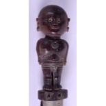AN AFRICAN CARVED HARDWOOD TRIBAL INLAID STAFF modelled as a standing male incised with zig zag like