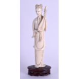 A LATE 19TH CENTURY CHINESE CARVED IVORY FIGURE OF A FEMALE modelled holding an instrument. Ivory 18