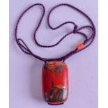 A SMALL EARLY 20TH CENTURY JAPANESE MEIJI PERIOD RED LACQUER NECKLACE decorated with foliage. 4.5 cm