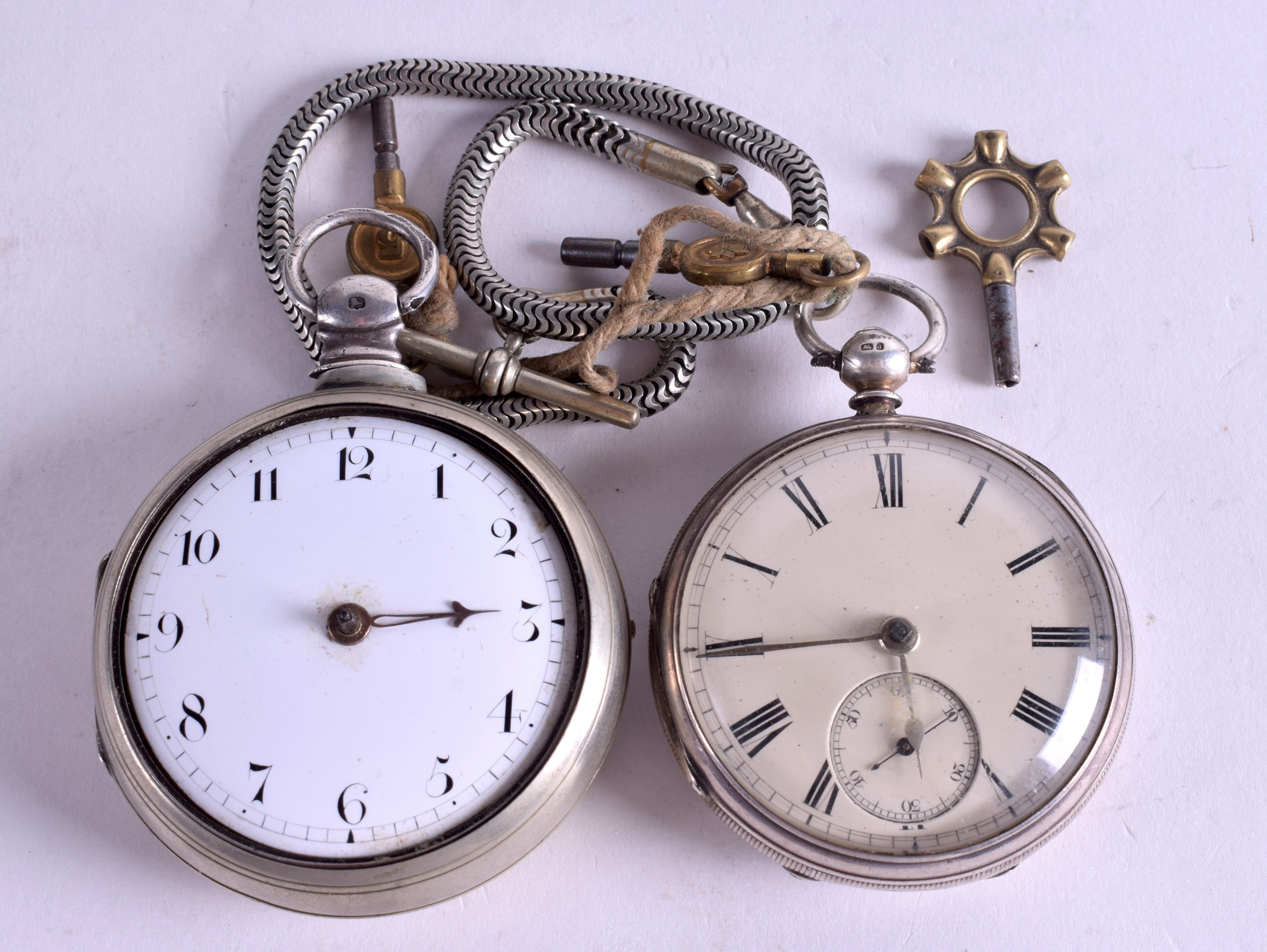 TWO ANTIQUE SILVER POCKET WATCHES. (2)