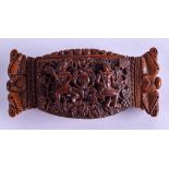 A 19TH CENTURY CONTINENTAL CARVED COQUILLA NUT SNUFF BOX carved with figures amongst vines. 9 cm x 3