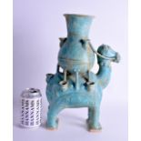 A CENTRAL ASIAN MIDDLE EASTERN PERSIAN KASHAN TURQUOISE FIGURE OF A CAMEL modelled with an urn upon