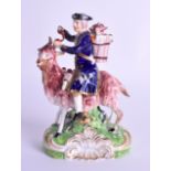 AN EARLY 19TH CENTURY DERBY FIGURE OF THE WELSH TAILOR modelled riding upon a deer. 15 cm x 9 cm.