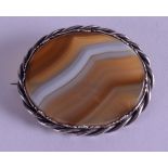 A 1920S SILVER MOUNTED AGATE BROOCH. 3.75 cm wide.