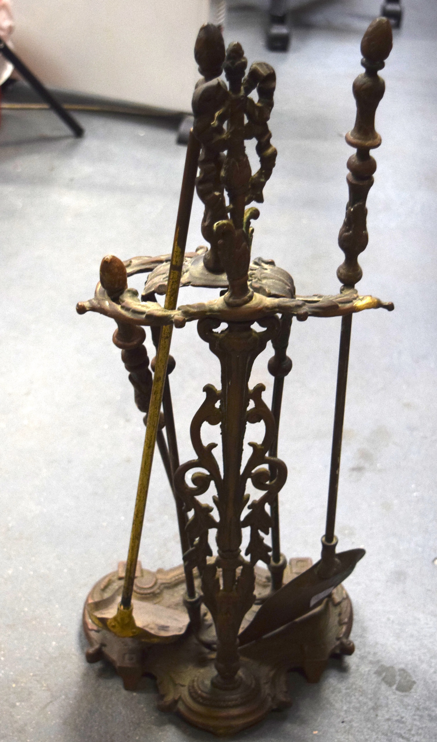 A SET OF VICTORIAN FIRE TOOLS, together with associated stand, decorated in relief with foliage. 68 - Image 3 of 3