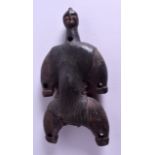 AN UNUSUAL EARLY 20TH CENTURY AFRICAN TRIBAL FERTILITY FIGURE in the form of a flattened pregnant fe