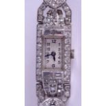 A GOOD ART DECO PLATINUM AND DIAMOND COCKTAIL WRISTWATCH. 21.5 grams. 1.5 cm x 2.5 cm.