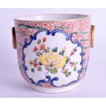 AN 18TH CENTURY FRENCH KAKIEMON PORCELAIN TWIN HANDLED BOWL painted with flowers and vines. 7.25 cm