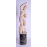 A LARGE 19TH CENTURY CARVED ALABASTER FIGURE OF A DANCING FEMALE modelled upon a green marble base.