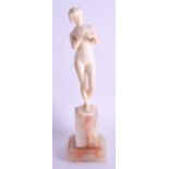 A LOVELY ART NOUVEAU CARVED IVORY FIGURE OF A NUDE FEMALE modelled upon a stepped onyx base. Ivory 1