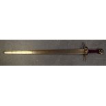 A EUROPEAN LONG SWORD, etched with the face of a roaring lion. 104 cm long.