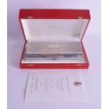 A LOVELY FRENCH CARTIER SILVER GOLD AND SAPPHIRE RECTANGULAR BOX within original fitted case. 31.8 o