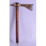 AN EARLY 20TH CENTURY NORTH AMERICAN TOMAHWAK with engraved work to axe head. 37 cm x 21 cm.
