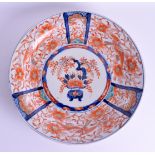 AN EARLY 19TH CENTURY JAPANESE EDO PERIOD IMARI DISH painted with urns, birds and foliage. 30 cm wid