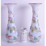 A FINE PAIR OF 19TH CENTURY BACCARAT OPALINE GLASS VASES overlaid with trailing vines and foliage. 3