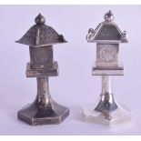A PAIR OF LATE 19TH CENTURY JAPANESE MEIJI PERIOD SILVER PAGODA CONDIMENTS upon hexagonal bases.145
