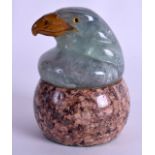 A 19TH CENTURY CARVED FLUORITE AND MARBLE PAPERWEIGHT in the form of a parrots head. 9 cm x 6 cm.