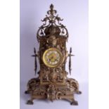 A LARGE 19TH CENTURY FRENCH BRONZE MANTEL CLOCK formed as a central dial cased within lion mask head