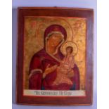 A LARGE 19TH CENTURY RUSSIAN PAINTED WOOD ICON depicting the Madonna and child. 32 cm x 40 cm.