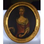 ATTRIBUTED TO ENOCH SEEMAN (1694-1745) FRAMED OIL ON CANVAS, half length portrait of a lady holding