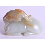 AN EARLY 20TH CENTURY CHINESE CARVED JADE FIGURE OF A RAM Late Qing/Republic. 5.5 cm x 3.5 cm.